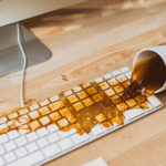 Coffee spilled on computer keyboard.
